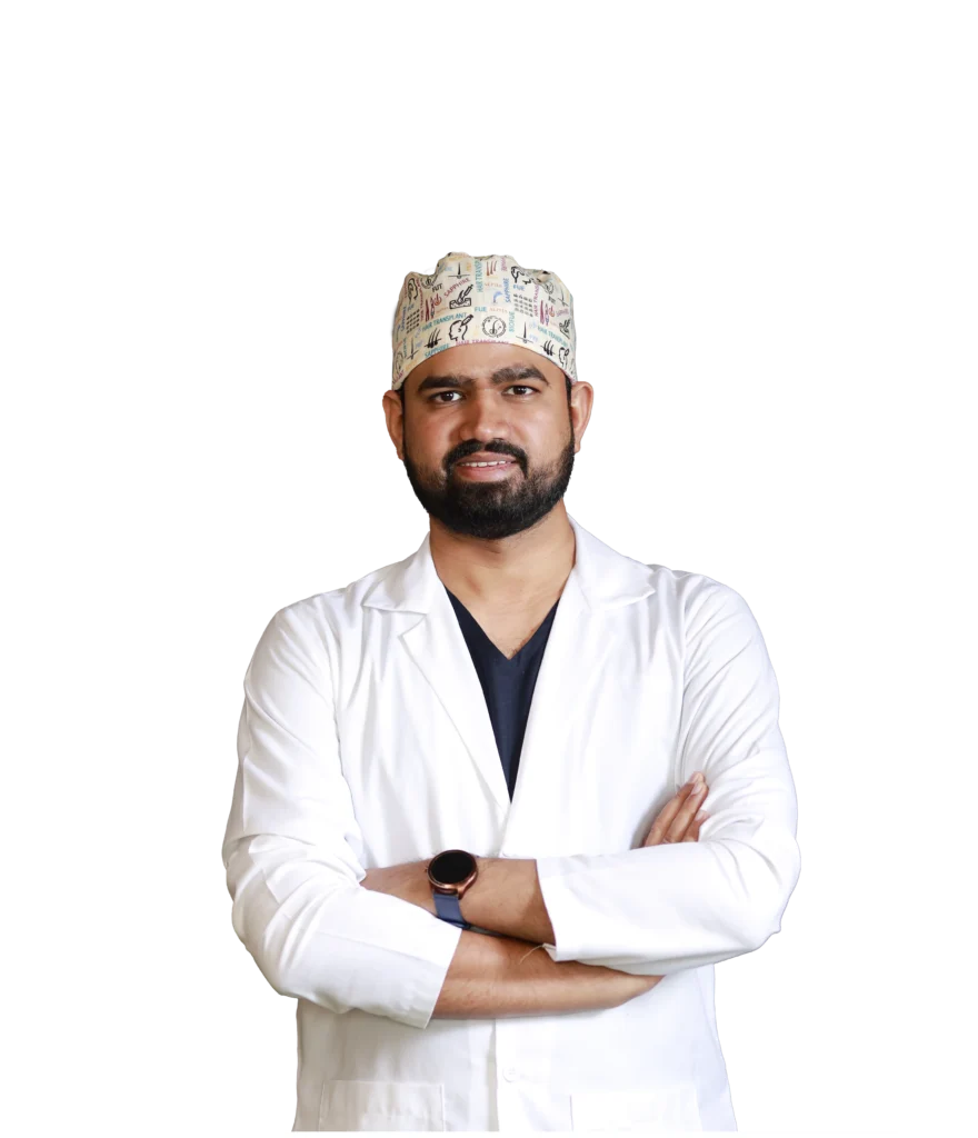 Dr. Kiran Chotaliya, experienced hair transplant surgeon in Pune, standing with arms crossed at Hairfree & Hairgrow Clinic
