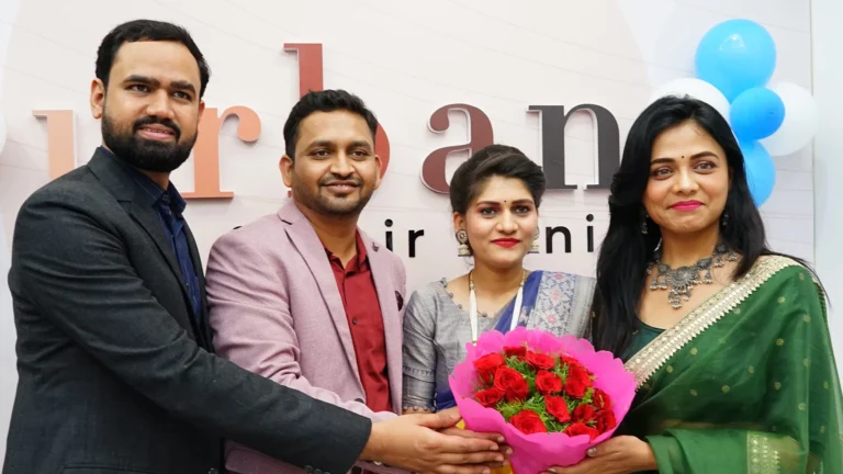 Dr. Kiran Chotaliya celebrating the opening of a new clinic