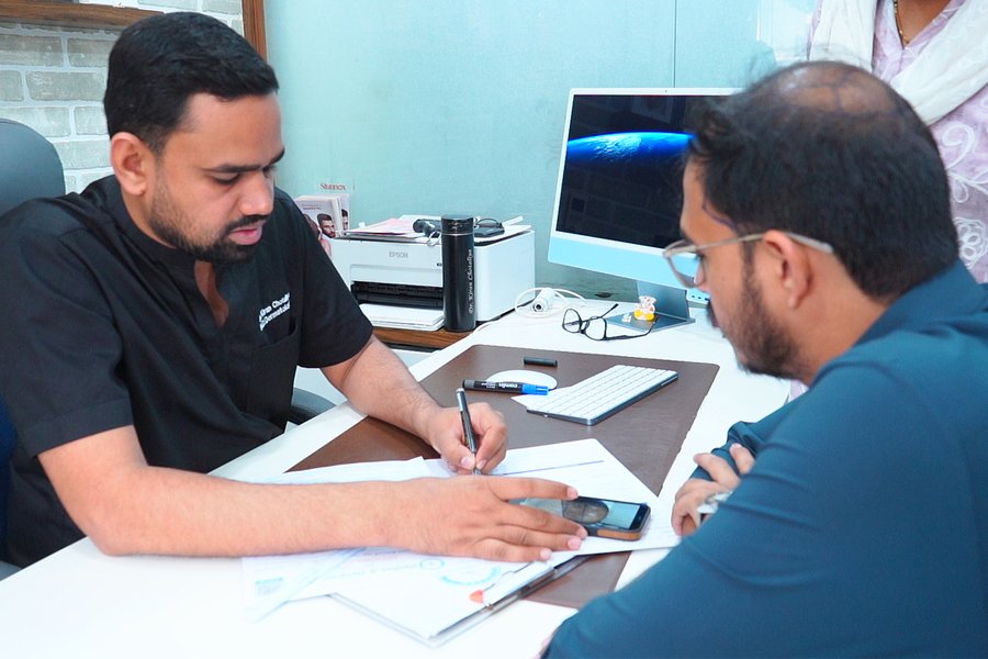 Hair transplant consultation with doctor and patient in clinics